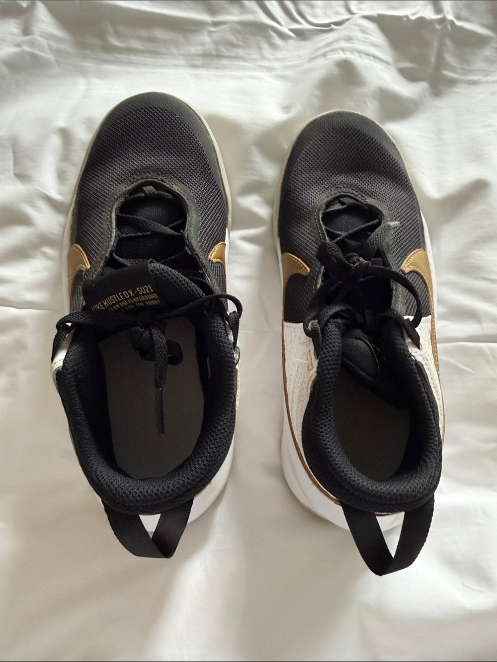 Nike Kids Black and Gold Low-Top Sneakers
